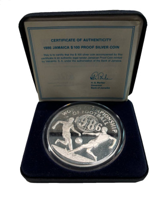 Ямайка 100 долларов 1986 Чемпионат мира по футболу 1986, Мексика, в оригинальной упаковке, с сертификатом подлинности KM 122 серебро PROOF 8-2-07-11